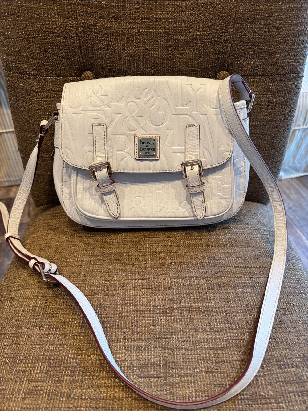 Dooney & Bourke Retro Grafica logo embossed messenger camera crossbody bag